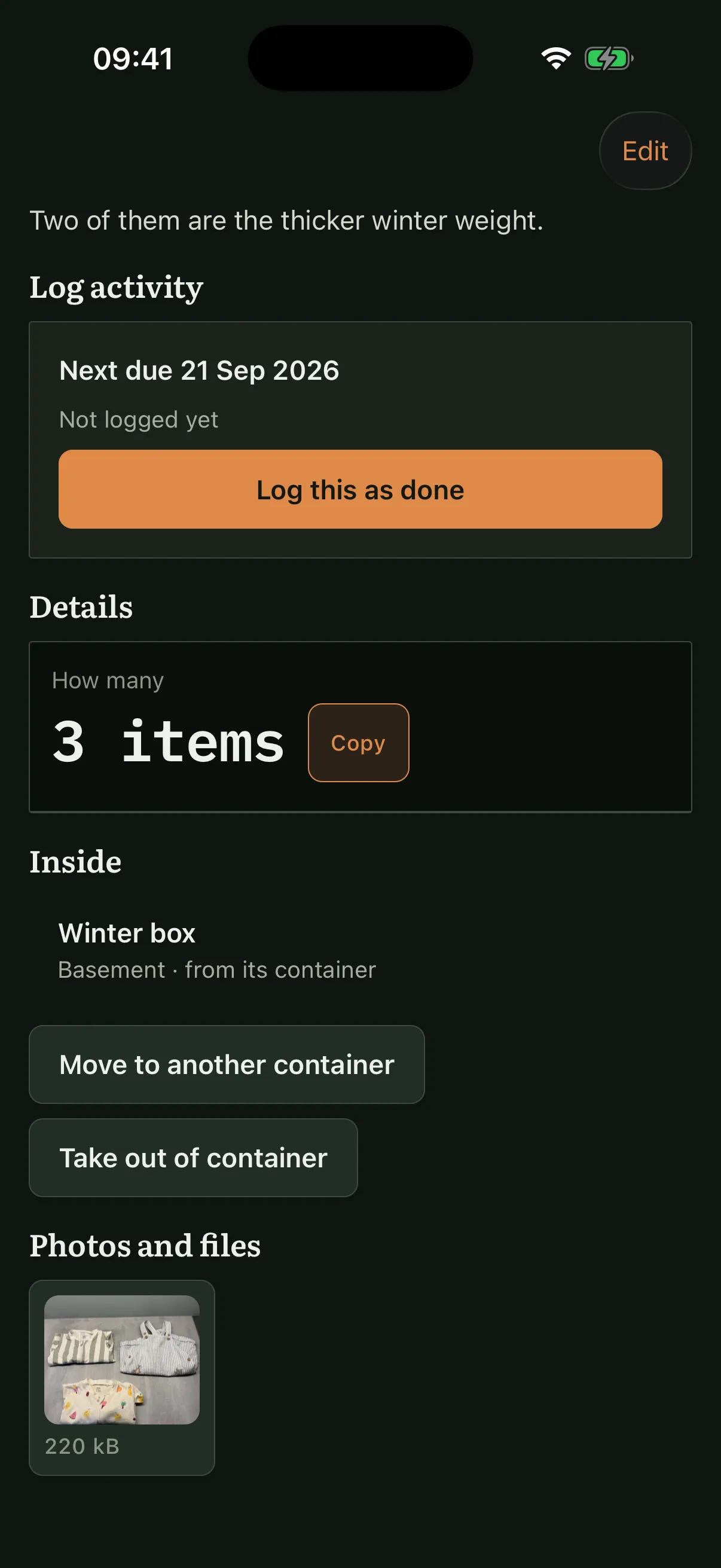 The sleepsuits as an entry in their own right: their own note that two of the three are the thicker winter weight, their own count of three items, their own next-due reminder, a photograph, and the container they are inside with actions to move them or take them out.