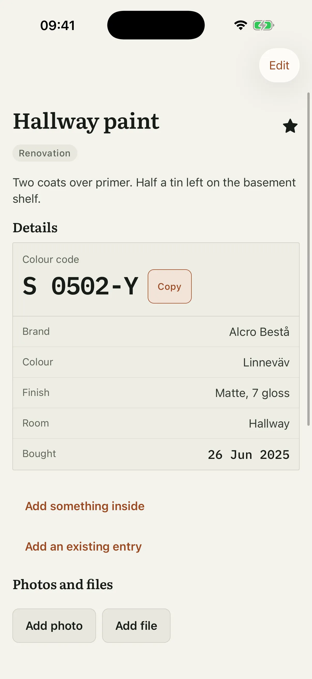 The hallway paint entry in light mode, with the colour code S 0502-Y promoted above the plate beside a button that copies it, and the brand, colour name and finish on the plate below.