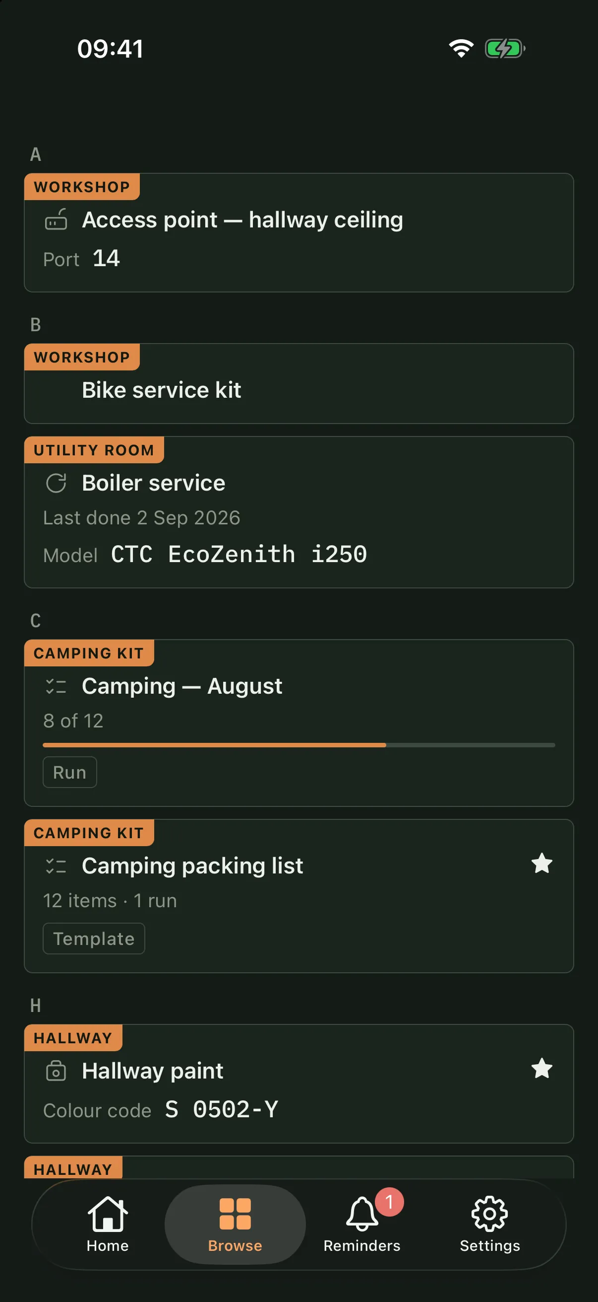 The browse screen listing everything in one alphabetical list, each row naming which room or collection it belongs to — an access point in the Workshop, the boiler service in the Utility room, a camping run in Camping kit, the hallway paint in the Hallway.
